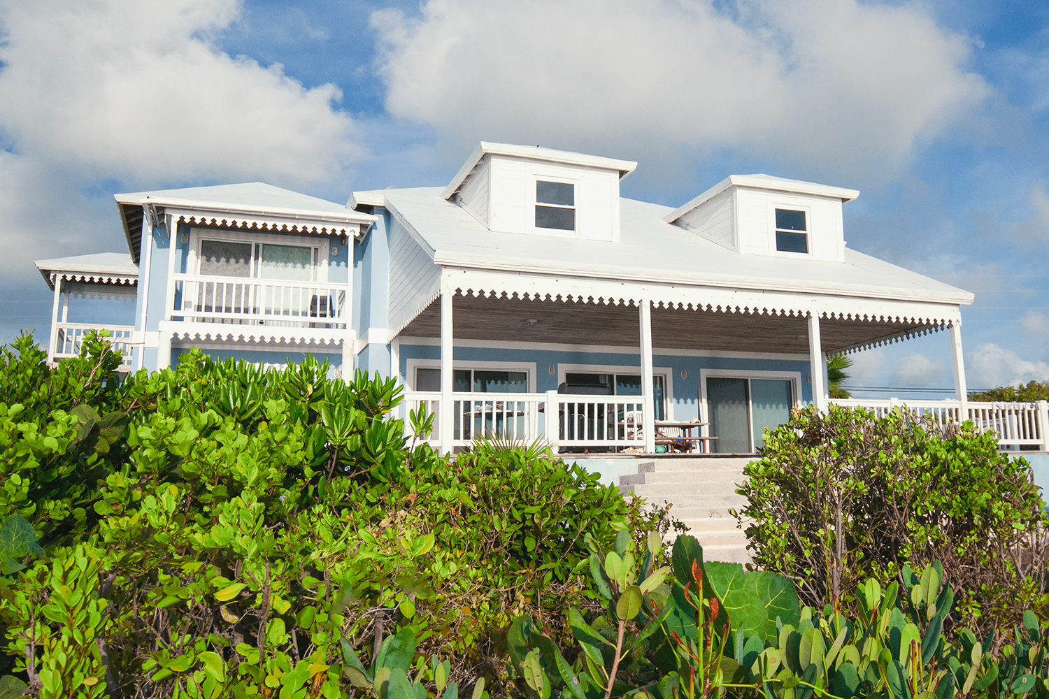 Oceanfront deck at The Blue House in San Salvador, Bahamas